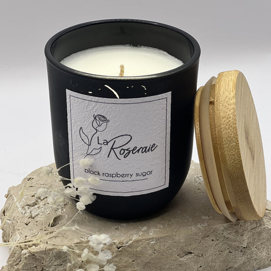 Classic collection coco soy candle in matte black jar with matching natural timber lid. Black Raspberry & Sugar fragrance.