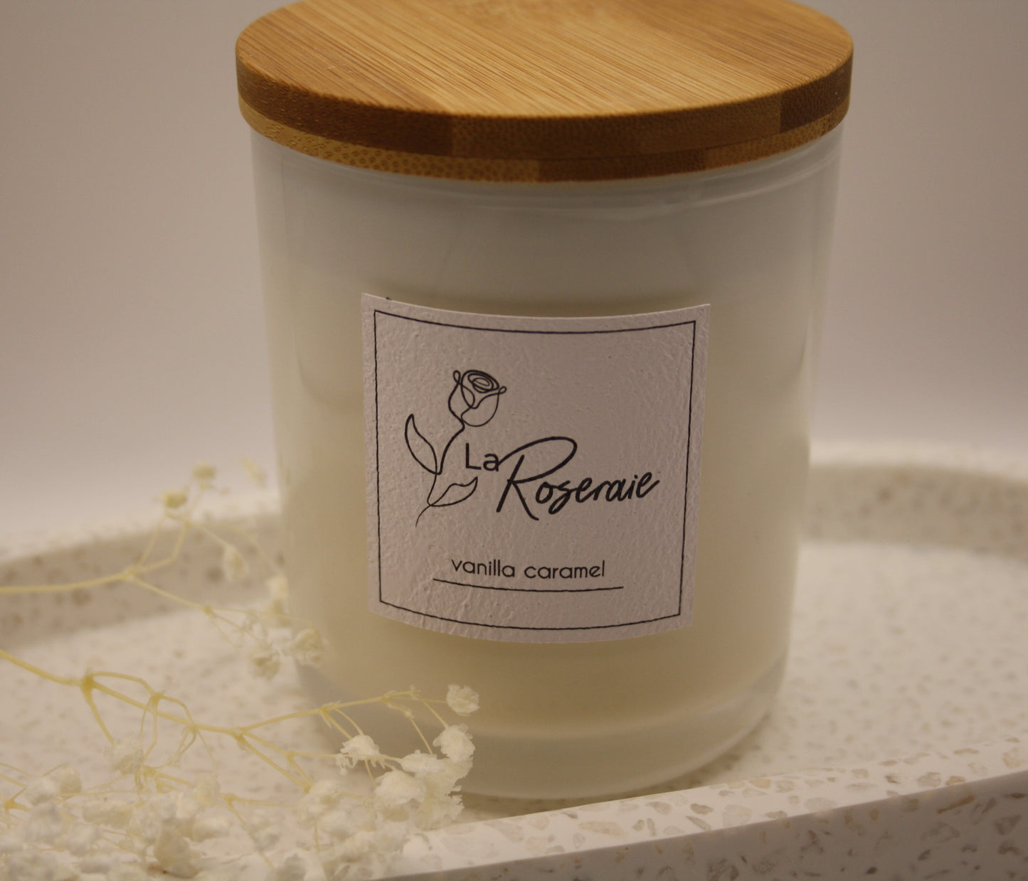 Classic collection coco soy candle in gloss white jar with matching natural timber lid.  Vanilla Caramel fragrance.