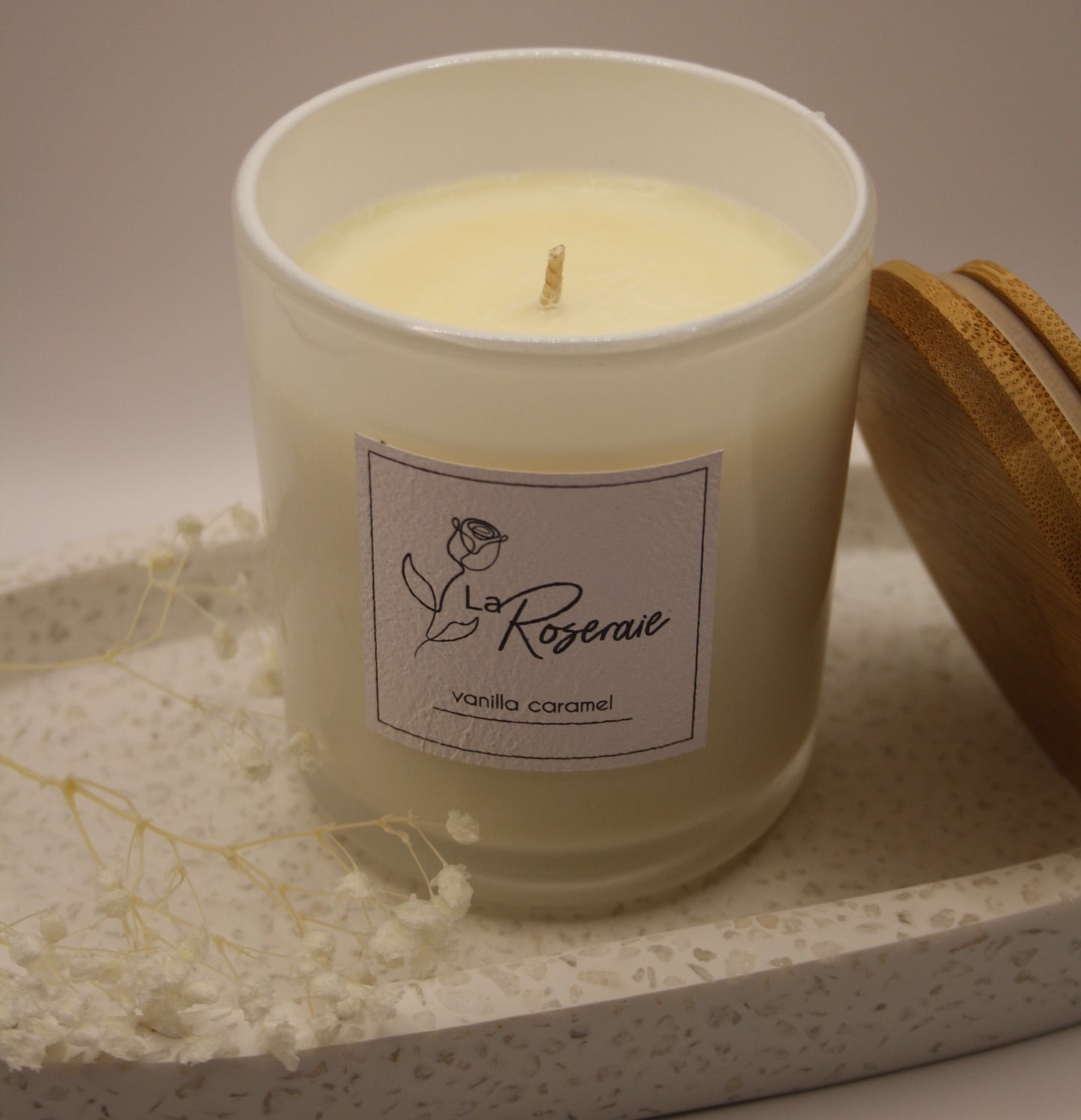 Classic collection coco soy candle in gloss white jar with matching natural timber lid.  Vanilla Caramel fragrance.