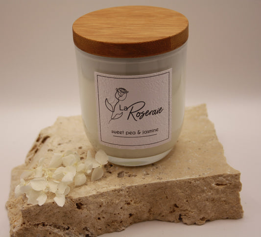 Classic collection coco soy candle in gloss white jar with matching natural timber lid.  Sweet Pea & Jasmine fragrance.