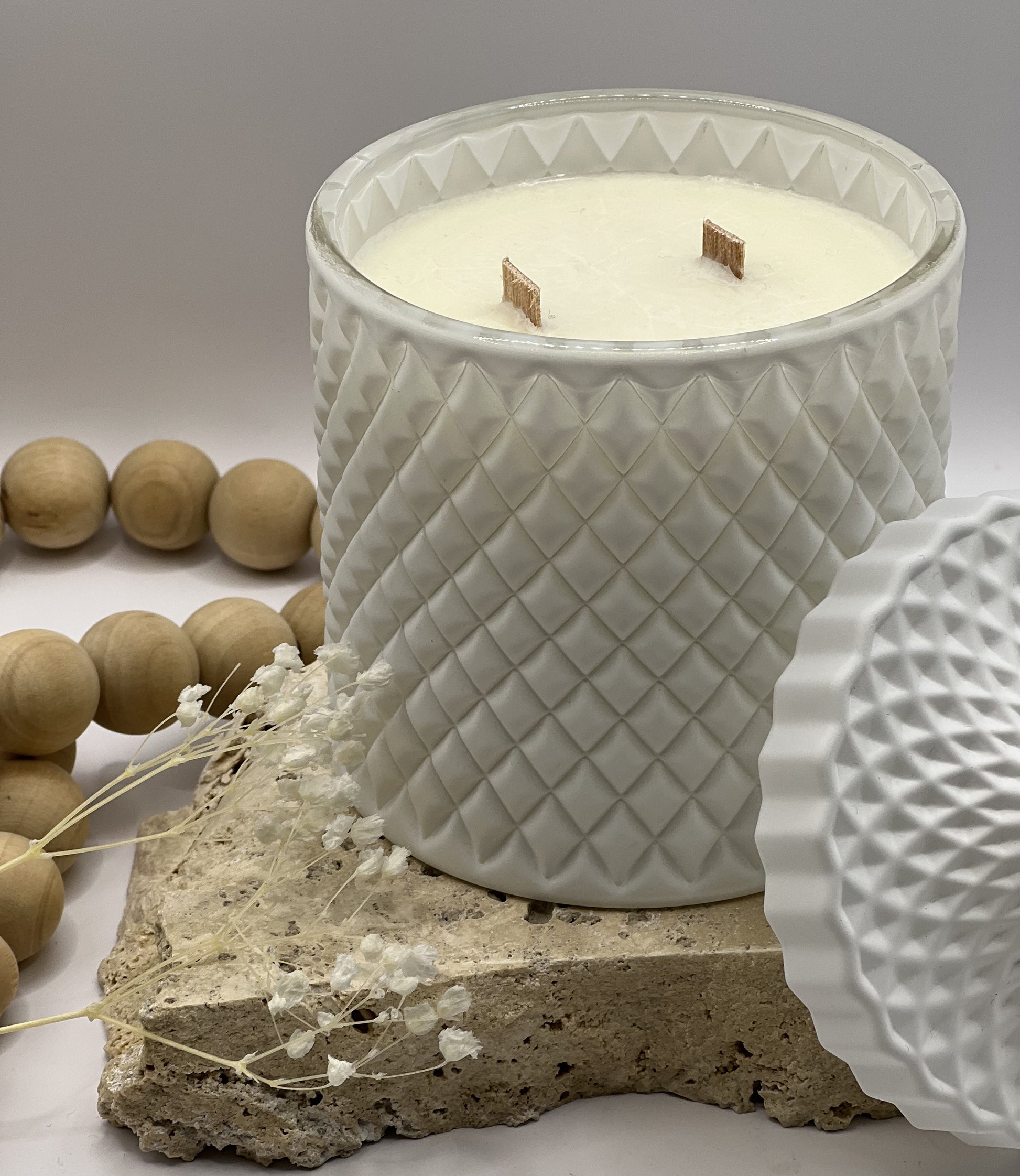 Our stunning Luxe candle range is presented in a geometric white cut glass vessel, designed for the luxurious or discerning person. Available in all our beautiful fragrances, the Luxe candle range includes a double wood wick, which provides a subtle crackling sound when alight. 480g coconut soy wax I 95 hour burn time.