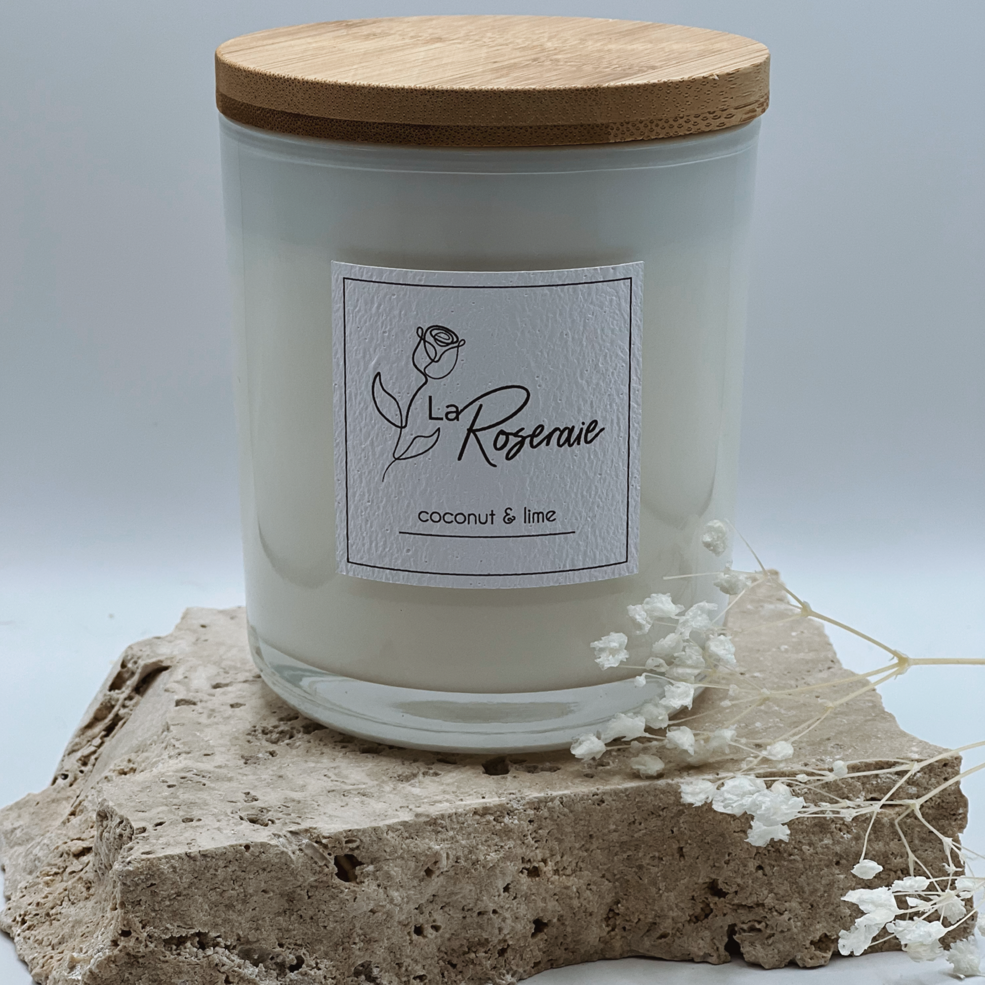 Classic collection coco soy candle in gloss white jar with matching natural timber lid.  Coconut Lime fragrance.